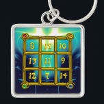 Porte-clés MAGIC CARRÉ 33, Gold Aqua Blue Turquoise<br><div class="desc">Les nombres sont placés de sorte que la somme de chaque ligne (sens horizontal ),  chaque colonne (sens vertical ) et chaque diagonale du "Carré magique" "le résultat est toujours 33. Idée et calcul par Alessandro Lumini,  conception et modélisation par Bulgan Lumini. Partie de la série Hyper Talismans.</div>