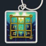 Porte-clés MAGIC CARRÉ 33, Gold Aqua Blue Turquoise<br><div class="desc">Les nombres sont placés de sorte que la somme de chaque ligne (sens horizontal ),  chaque colonne (sens vertical ) et chaque diagonale du "Carré magique" "le résultat est toujours 33. Idée et calcul par Alessandro Lumini,  conception et modélisation par Bulgan Lumini. Partie de la série Hyper Talismans.</div>