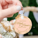 Porte-clés Maid of Honor Mariage Cadeau Gold Frills Coral Pea<br><div class="desc">Ces porte - clés sont conçus pour rendre service à la servante d'honneur lors de votre mariage. Elles présentent un design simple mais élégant avec un corail pâle, de la pêche ou un arrière - plan de couleur orange clair, du texte doré et une bordure florale en faux feuille doré...</div>