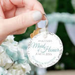 Porte-clés Maid of Honor Mariage Don Turquoise & Grey Lacy<br><div class="desc">Ces porte - clés sont conçus pour rendre service à la servante d'honneur lors de votre mariage. Conçues pour s'harmoniser avec notre Turquoise & Grey Elegant Wedding Suite, elles présentent un design simple mais élégant avec un arrière - plan blanc, un texte turquoise ou turquoise & gris, et une bordure...</div>
