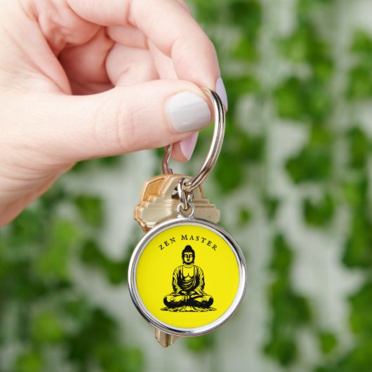 Porte-clés Maître Zen - Méditation Bouddha Jaune (main)