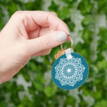 Mandala blanc sur fond bleu