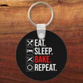 Porte-clés Manger. Dormir. Du pain. Recommencer (Verso)