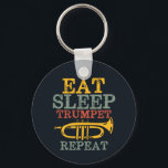 Porte-clés Mangez la trompette du sommeil Répéter la bande ma<br><div class="desc">Conception amusante de trompette pour ceux qui jouent de l'instrument de musique en laiton dans un groupe de musique, orchestre ou performance musicale. Cool vintage retro Merchandises pour amoureux de musique jazz pour musicien et membre du groupe de marche. Parfait pour les professeurs de musique, les fans d'orchestre et ceux...</div>