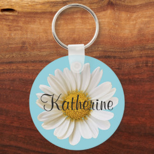 Porte-clés Marguerite blanche avec nom personnalisé bleu ciel