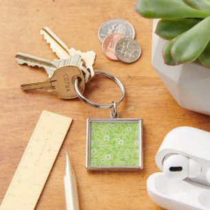 Porte-clés Marguerites en blanc et vert sur fond vert miel