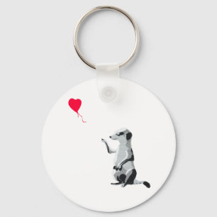 Porte-clés Meerkat et le ballon rouge