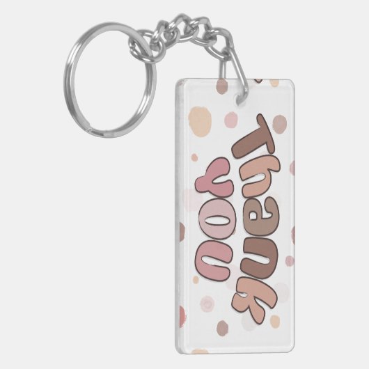 Porte-clés Merci (Devant gauche)