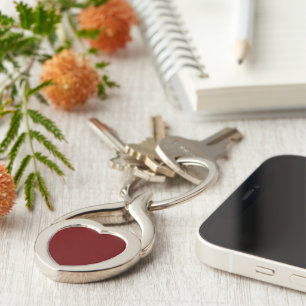 Porte-clés métallique à coeur rouge sang