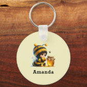 Porte-clés Mignonne fille en costume d'abeille avec miel (Recto)