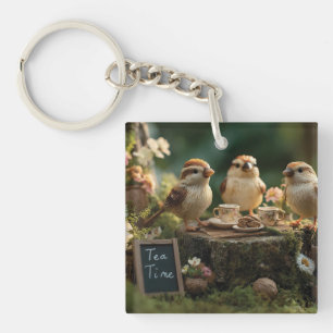 Porte-clés Miniatures de figurines d'oiseaux ayant un thé dan