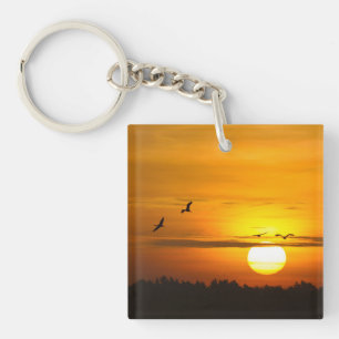 Porte-clés Moments romantiques Grues au lever du soleil photo