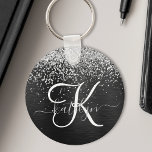 Porte-clés Monogramme à étincelle noire à Parties scintillant<br><div class="desc">Personnalisez facilement ce design porte - clé élégant et branché avec une jolie parties scintillant brillante en argent sur un arrière - plan métallique brossé noir.</div>