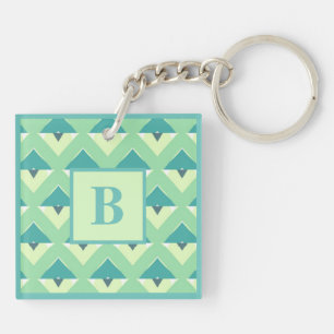 Porte-clés Monogramme à motif géométrique bleu et sarcelle