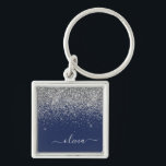 Porte-clés Monogramme à Parties scintillant étincelante en ar<br><div class="desc">Parties scintillant Argent et Marine Blue Sparkle Script Monogramme Nom Clés (Porte - clé). Cela rend le cadeau parfait pour 16 ans,  mariage,  douche nuptiale,  anniversaire,  baby shower ou bachelorette pour quelqu'un qui aime le luxe glam et les styles chic.</div>