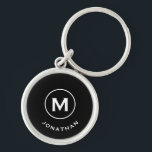 Porte-clés Monogramme classique noir minimal<br><div class="desc">Le porte - clé rond monogrammé minimal dispose d'un arrière - plan noir avec votre initiale et votre nom dans la typographie de bloc classique en blanc pour un look professionnel classique simple.</div>