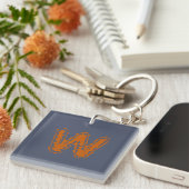 Porte-clés Monogramme déplaisant avec collision orange sur bl (Devant Droit)