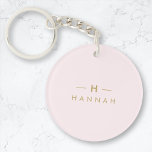 Porte-clés Monogramme Elegant Minimal Blush rose et or<br><div class="desc">A simple stylish custom monogram design in a gold minimalist typographiy on an elegant pastel blush pink background. The monogram initials and name can easily be personalized along with the feature line to make a design as unique as you are! Le parfait poison de l'accessoire pour un instant.</div>