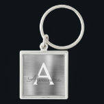 Porte-clés Monogramme en acier inoxydable faux argent de luxe<br><div class="desc">Chaîne de clés métallique en acier inoxydable faux argent de luxe élégante. Ces porte-clés peuvent être personnalisés pour inclure votre initiale et votre prénom. Ces porte-clés font de superbes cadeaux d'anniversaire,  de shower de mariage ou de fête de bachelorette.</div>