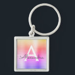 Porte-clés Monogramme en acier inoxydable rose et violet<br><div class="desc">Pastel Pink,  Orange et Violet Ombre Faux Acier Inoxydable Metallic Porte - clé élégant. Ces Porte - clés peuvent être customisés pour inclure votre nom initial et prénom. Ces porte - clés fêtent un grand anniversaire,  une douche nuptiale ou une fête de bachelorette.</div>
