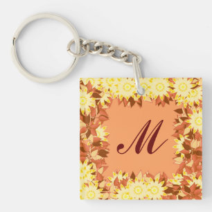Porte-clés Monogramme encadré de fleurs - cacao et jaune