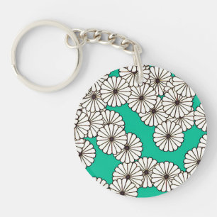 Porte-clés Motif de fleurs Art déco - blanc sur turquoise