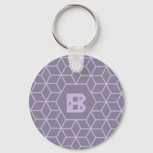 Porte-clés Motif de monogramme de cubes géométriques violets