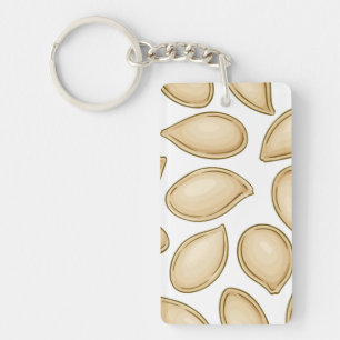 Porte-clés motif de semences citrouille