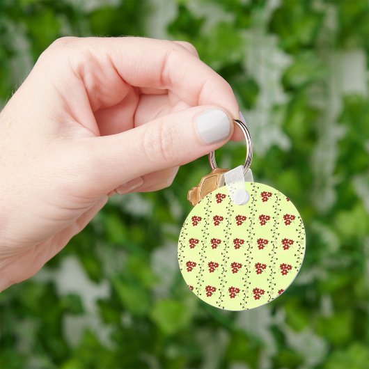 Porte-clés Motif de vigne florale rouge sur fond vert clair