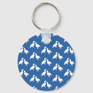 Porte-clés Motif d'oiseaux bleu et blanc.