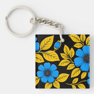 Porte-clés Motif floral bleu avec feuilles dorées