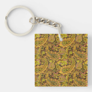 Porte-clés Motif Paisley en jaune, marron sur fond noir