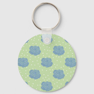 Porte-clés Motif rose bleu sur fond vert