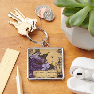 Porte-clés musical vintage aubergine paon