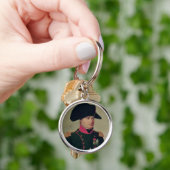 Porte-clés Napoléon I devant le château de Malmaison (main)