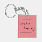 Porte-clés "N'arrêtez jamais de rêver" Phrase Noir (Devant gauche)