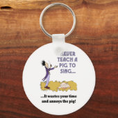 Porte-clés Ne Jamais Enseigner Un Cochon À Chanter Porte - cl (Recto)