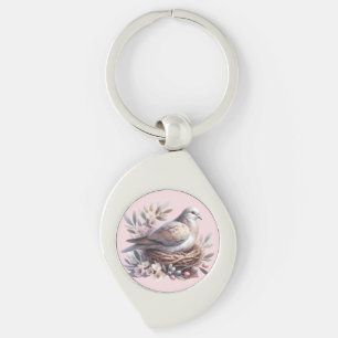Porte-clés Nid de colombe rose avec fleurs et branches d'oliv