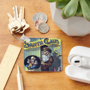 Porte-clés Noël vintage, le Père Noël et son oeuvre