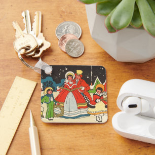 Porte-clés Noël vintage, une famille chantant des chants de m