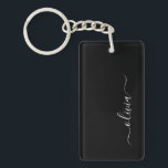 Porte-clés Noir Blanc Moderne Minimaliste Élégant Monogramme<br><div class="desc">Découvrez notre collection minimaliste moderne de monogrammes noirs et blancs : Faites preuve de simplicité et de sophistication grâce à nos designs minimalistes, conçus pour élever votre style sans effort. Réalisée avec un oeil attentif pour l'esthétique moderne, cette collection présente des motifs noirs et blancs épurés accentués par des monogrammes...</div>