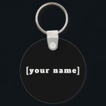 Porte-clés noir et blanc avec ton nom<br><div class="desc">Porte-clés noir et blanc avec ton nom</div>