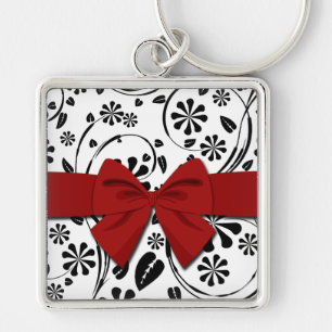 Porte-clés Noir sur le motif de fleur de marguerite blanche
