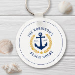 Porte-clés Nom de famille Beach House Ancre Gold Laurel Star<br><div class="desc">Un porte - clé en métal de style nautique avec votre nom de famille personnalisé et maison de plage, maison de lac, ou tout autre texte désiré et date établie. Doté d'une ancre de bateau conçue sur mesure avec des feuilles de laurier de style or et d'une étoile sur le...</div>