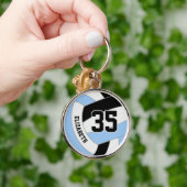 Porte-clés nom du joueur numéro de maillot sur bleu noir voll (Main)