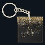 Porte-clés Nom du monogramme de la Parties scintillant d'or<br><div class="desc">Glam Gold Parties scintillant Élégant Monogram Nom Porte - clé Personnalisez facilement ce design porte - clé chic branché avec élégante parties scintillant dorée sur un arrière - plan noir. Le design comprend votre monogramme manuscrit avec de jolis tourbillons et nom.</div>