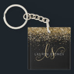 Porte-clés Nom du monogramme de la Parties scintillant d'or<br><div class="desc">Glam Gold Parties scintillant Élégant Monogram Nom Porte - clé Personnalisez facilement ce design porte - clé chic branché avec élégante parties scintillant dorée sur un arrière - plan noir. Le design comprend votre monogramme manuscrit avec de jolis tourbillons et nom.</div>