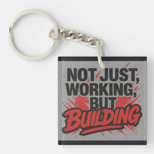 Porte-clés Non Seulement Travailler, Mais Bâtir Un porte - cl