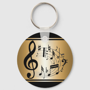 Porte-clés Notes musicales en noir et or en forme ovale