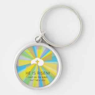 Porte-clés Nuage et croix renforcés avec rayons lumineux colo